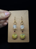 Golden lip shell butterfly earrings - with clear quartz and garnet