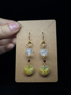 Golden lip shell butterfly earrings - with clear quartz and garnet