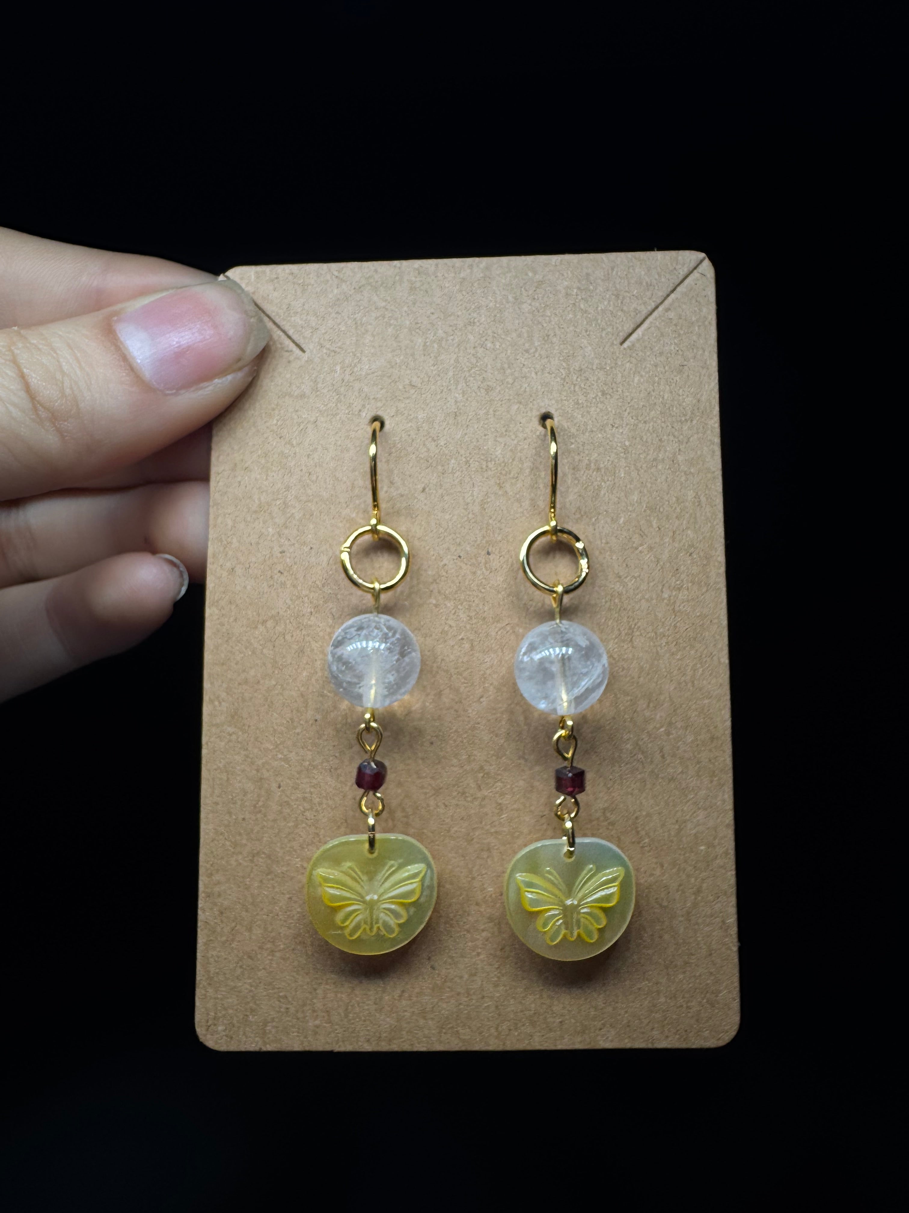 Golden lip shell butterfly earrings - with clear quartz and garnet